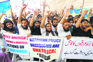 Supporters of the Jamaat-ud-Dawa chant slogans during a protest in Lahore on Friday. The US State Department has named a JuD as a foreign terrorist organisation, a status that freezes any assets it has under the US jurisdiction.