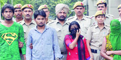 The Delhi police arrested four people, including two women, involved in the murder-cum-robbery case of a businessman at Rajinder Nagar in New Delhi on Saturday. Tribune photo