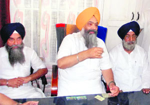 SAD leader Prem Singh Chandumajra (centre) talks to mediapersons in Ambala on Saturday. 