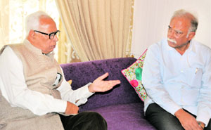Governor NN Vohra with Union Civil Aviation Minister Pusapati Ashok Gajapathi Raju at Raj Bhawan on Saturday.