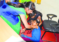 A student fainted while discussing the issue with Surjit Kumar Jyani, Health and Family Welfare Minister, in Ludhiana. Photo : Inderjeet Verma