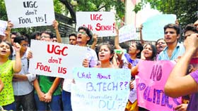 BTech students raise slogans outside the HRD Ministry against the rollback of the FYUP by Delhi University in Delhi on Saturday