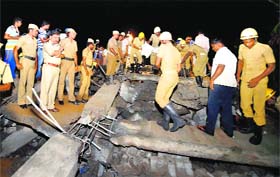 In Chennai: An under-construction building collapsed in Porur near Chennai on Saturday. One person was killed and several others feared trapped in the building