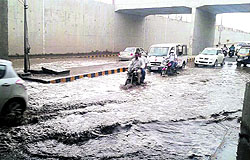 The waterlogged railway overbridge on the Bathinda-Mansa road