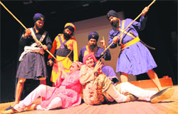 Artistes stage a play. Baba Banda Singh Bahadur, at Punjab Kala Bhawan, Sector 16, Chandigarh, on Sunday. Tribune Photo: Pradeep Tewari