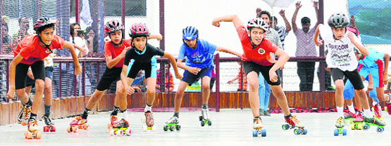Players participate in a skating race at Manav Mangal Smart School, Phase X, Mohali, on Sunday. tribune photo: vicky gharu 