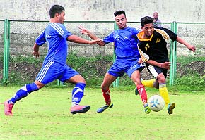 Players in action in a match at the Pavilion Grounds in Dehradun on Sunday.