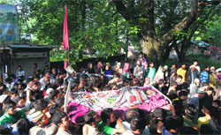 Kashmiris attend the funeral of Hizb militant Adil Ahmad Mir in Dadsuri Tral, 39 km from Srinagar. Tribune file Photo