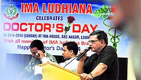 Plastic Surgeon Sanjeev Uppal adresses a gathering during the National Doctors Day celebrations in Ludhiana.