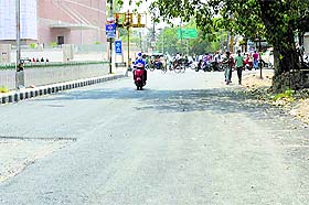 A road in dire need of repairs in Ludhiana.