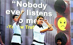 Members of Divam-Khula Aasman, an NGO, present a street play at Sarabha Nagar in Ludhiana on Sunday. 