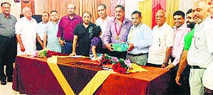 Members of Rotary Club felicitate District Governor Arun Gupta on his visit to Mandi Ahmedgarh.