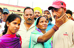 Vinod Kumar with his family members on his return from Iraq in Jalandhar