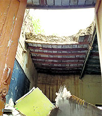 The collapsed roof of a classroom at the PURC