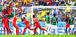 Wesley Sneijder (3rd L) of the Netherlands celebrates with his teammates after scoring a goal against Mexico during a World Cup tie in Fortaleza on Sunday