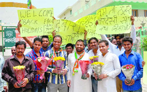 Youth Congress workers gather to welcome MP Kirron Kher outside the BJP’s office in Sector 33, Chandigarh, on Monday.
