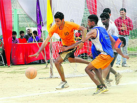 Players in action during the Target Ball National Tournament at the Parade Ground in Dehradun on Monday.