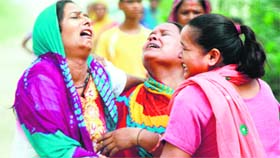 Relatives of the boys (below), who drowned in a Dhankot canal on Monday, are inconsolable.