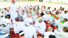 Farmers hold a panchayat at the Community Centre in Jhajjar on Monday.