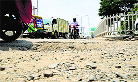 A bumpy ride welcomes commuters on their way to Dugri on this stretch of Gill Road in Ludhiana.