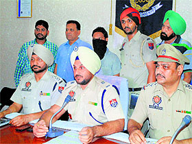 The accused in police custody.