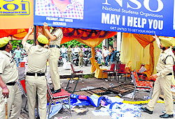 The police remove help desks after a clash between PUSU and SOI leaders at the PU in Chandigarh on Tuesday