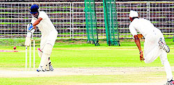 Players in action during a cricket match between Chandigarh and Mohali at the Sector 16 Cricket Stadium in Chandigarh on Tuesday