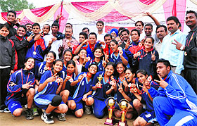 Players of Uttarakhand mens and womens teams celebrating after winning the All India Target Ball Tournament held at the Pavilion Ground in Dehradun on Tuesday.