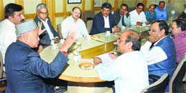 Chief Minister Virbhadra Singh presides over a meeting with representatives of cement companies at Shimla on Tuesday.