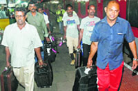 A batch of Indians workers, who were stranded in Iraq, arrives in Kozhikode on Tuesday.  PTI
