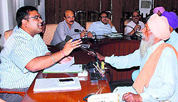 Deputy Commissioner Basant Garg meets people during a sangat darshan programme in Bathinda on Wednesday