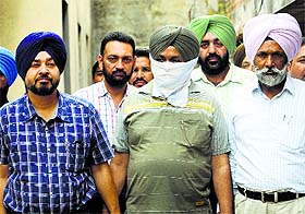 The accused in the custody of vigilance sleuths in Ludhiana on Wednesday.