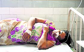 The woman, who consumed toilet cleaner, at the Civil Hospital in Ludhiana on Wednesday.