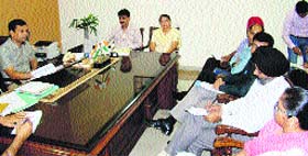 Deputy Commissioner Ravi Bhagat discusses plan of the Forest Department to launch plantation drive at a meeting held at his office in Amritsar on Thursday.