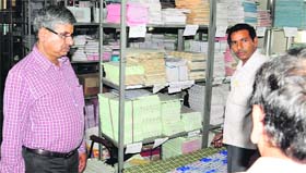CPS Sarup Chand Singla inspects the stocks in the MCs store in Bathinda.