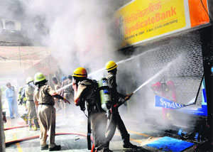 Firefighters in action at the bank in Sector 17.