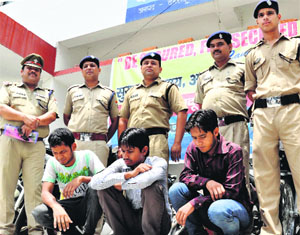 The accused in police custody in Dehradun on Thursday.