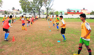 Under-19 players take part in a football camp at Marshal School in Dehradun on Thursday. 