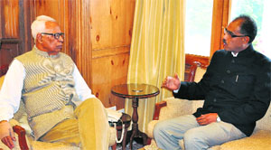 Governor NN Vohra with Ravi Thakur, Vice Chairperson, National Commission for Scheduled Tribes, at Raj Bhawan in Srinagar on Thursday. 