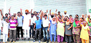 Residents of Maharishi Dayanand Chowk protest against the opening of a wine shop in Jalandhar on Thursday