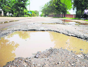 A damaged road near the Pameti house at PAU in Ludhiana.