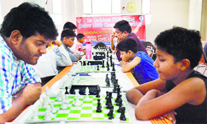 Raghav Bansal (right) mulls his next move during the FIDE Rating (below 1800) Prize Money Chess Tournament in Ludhiana on Thursday. 