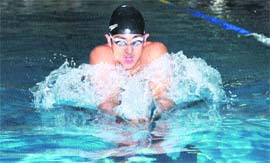 Tejinder Singh in action during a swimming meet held at the all-weather swimming pool in Sector 23, Chandigarh, on Friday.
