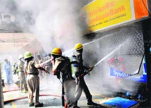 Firefighters in action at the bank in Sector 17.