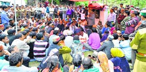Forest Minister TS Bharmouri addresses a gathering at Sechu in Pangi tribal valley on Thursday.