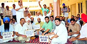 Congress councillors shout slogans on the third day of their protest in Ludhiana.