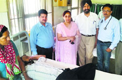 Raj Kumar under treatment at Nawanshahr Civil Hospital. Tribune photo: Malkiat Singh