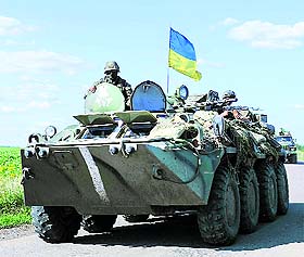 A military vehicle of the Ukrainian forces moves on the position near the Ukrainian city of Slavyansk.