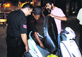 Punjab police commandos check a vehicle in Bathinda on Friday.