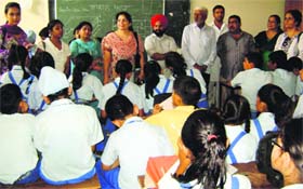 Students of Tribune Model School during an educational visit to Mullanpur village on Saturday.